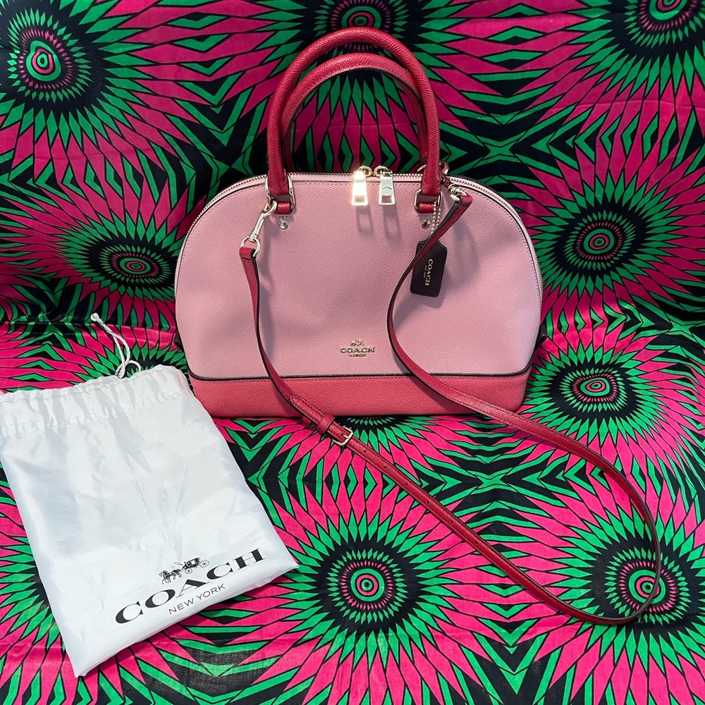 Coach pink shoulder bag with red crossbody strap.💗❤️